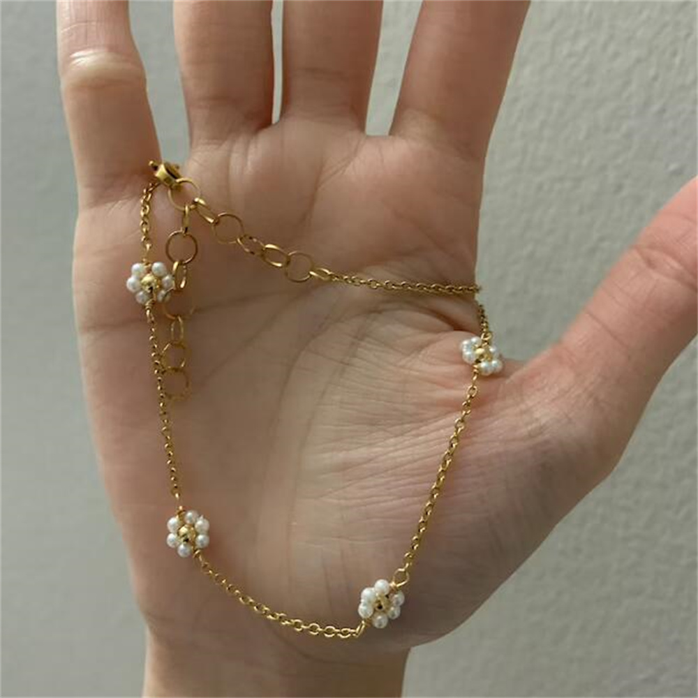 Collier chaîne de perles fleurs de marguerite